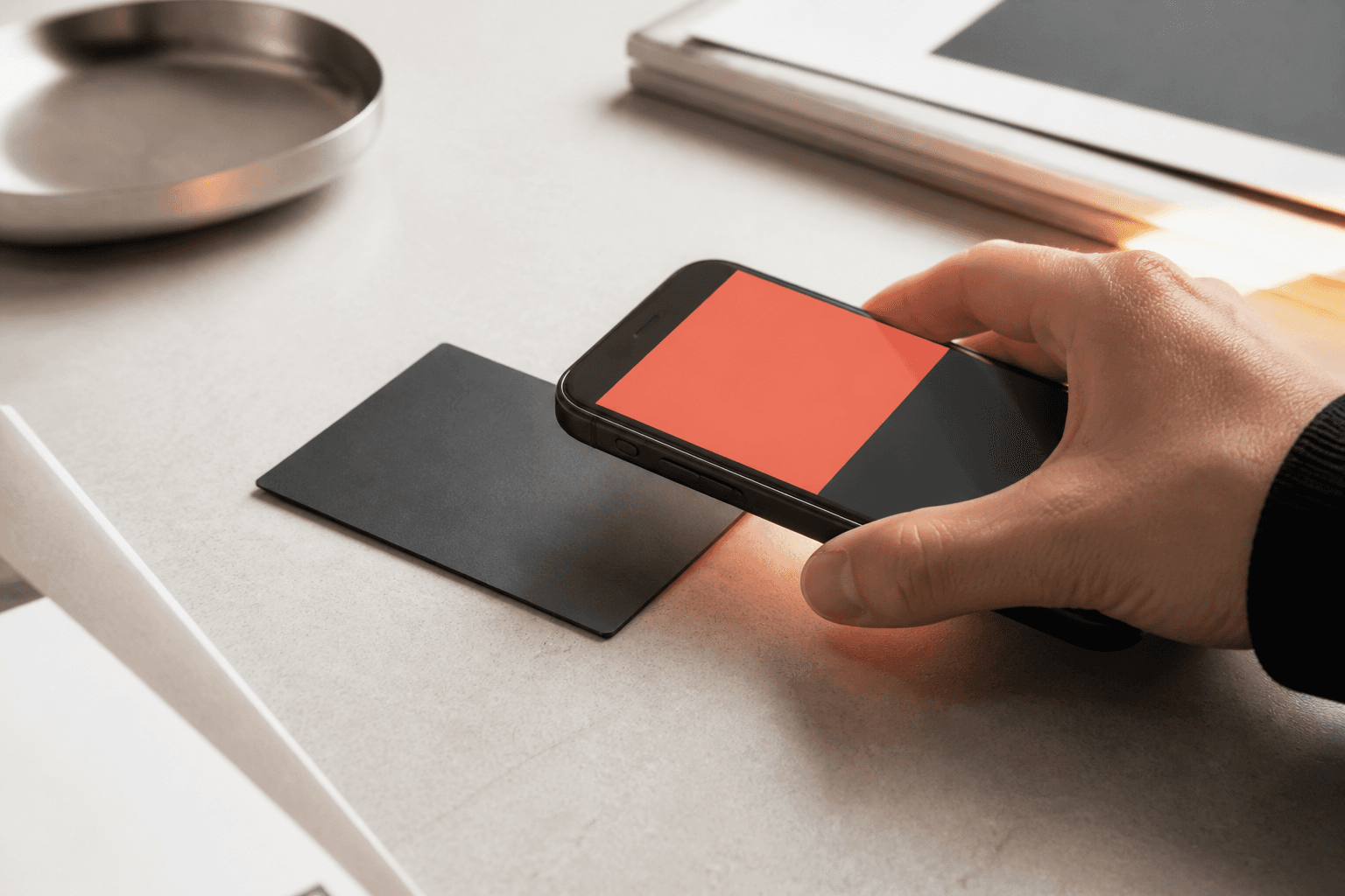 A phone tapping a physical Zexolt card